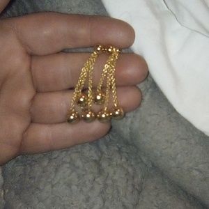 Gold dangling earrings